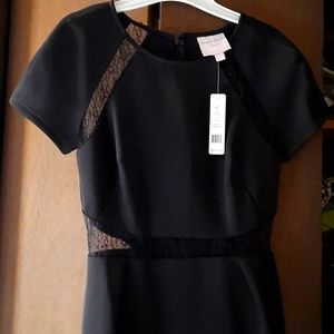 Little black dress with lace cutouts